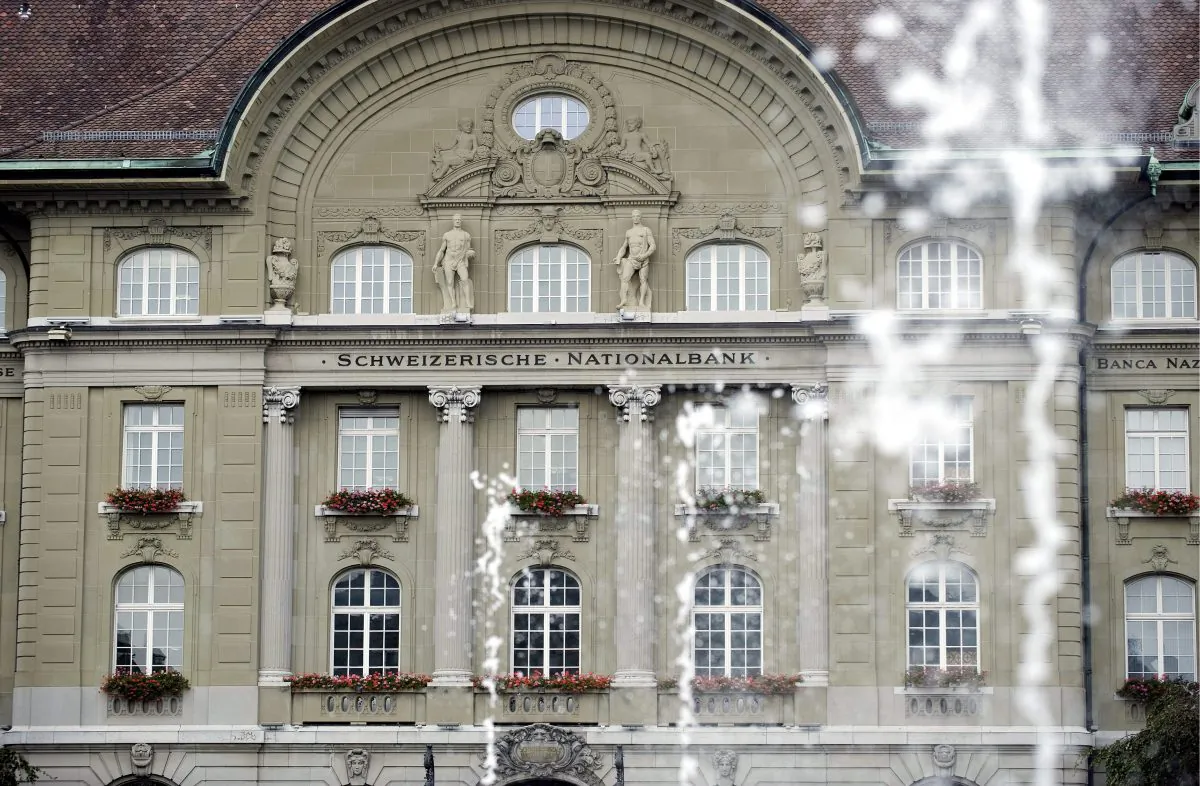 FILE - In this Oct. 8, 2008 file photo the Swiss National Bank is pictured in Bern, Switzerland. The bank says it is ending its minimum exchange rate policy that was meant to keep the euro from falling below 1.20 Swiss francs. Bank said in a statement Thursday, Jan. 15, 2015 that the measure, introduced in Sept. 2011, "protected the Swiss economy from serious harm" but is no longer justified. (AP Photo/Keystone, Peter Schneider, File)