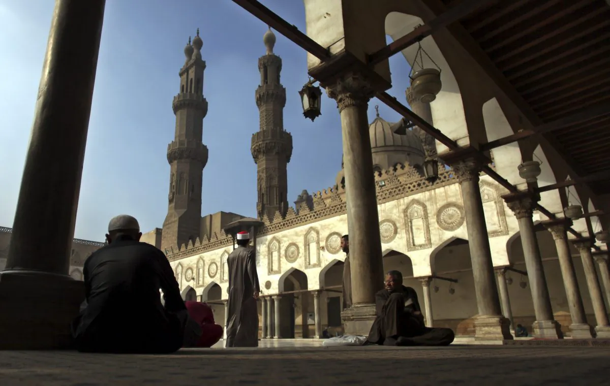 Muslims rest as they wait for the Friday noon prayer at Al-Azhar mosque in Cairo on Dec. 28, 2012. Egyptian President Abdel-Fattah el-Sissi opened 2015 with a dramatic call for a revolution in Islam. His professed goal is to purge the religion of extremist ideas of intolerance and violence that fuel groups like al-Qaeda and the Islamic State. To enact change, he is relying on state religious institutions, like the 1,000-year-old al-Azhar, one of the most imminent centers of Sunni Muslim thought. Shifting al-Azhar and other calcified institutions to rethink basic tenets and make them more appealing to young people in a modern age is difficult. (AP Photo/Khalil Hamra)