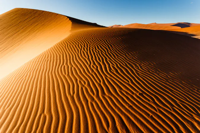 Sunlit Namibian desert via Shutterstock*