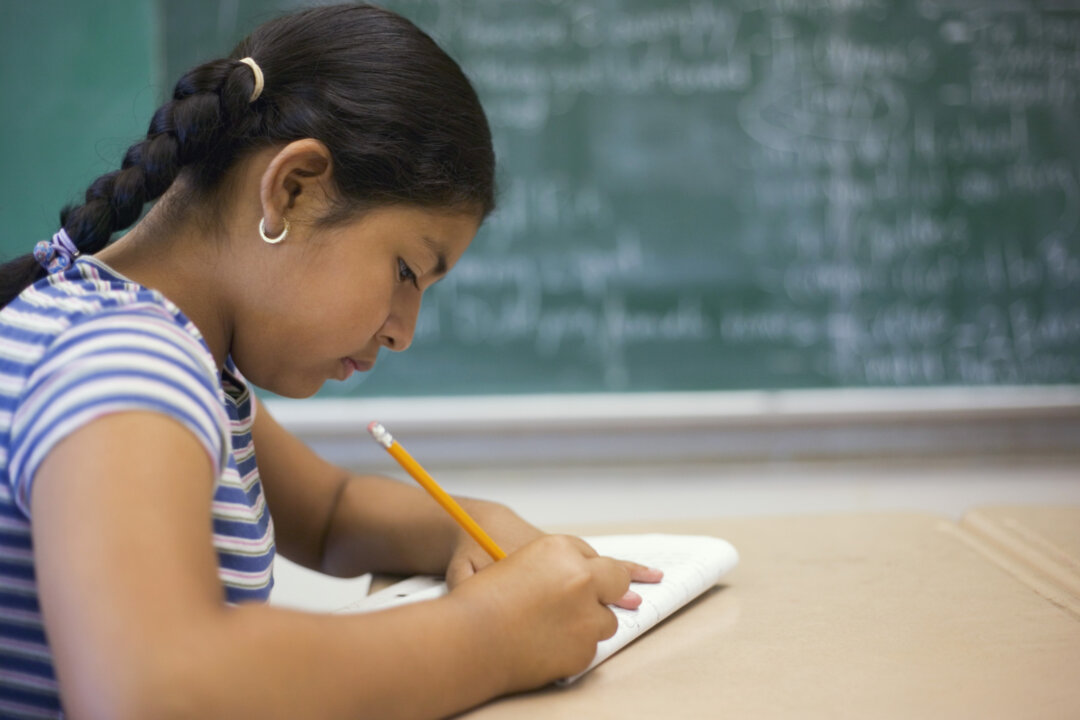 In a study on children’s report cards and sleep, greater sleep efficiency was associated with better math and language grades, but grades in science and art weren’t affected. (Creatas/Creatas/Thinkstock)