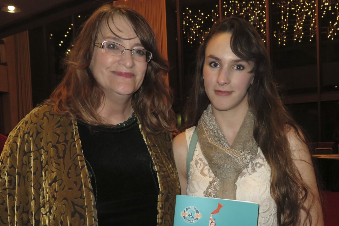 Mother and daughter Paula and Katie Ibsen attend Shen Yun Performing Arts at the Sacramento Community Center Theater, on Jan. 14, 2015. (Alex Ma/Epoch Times)