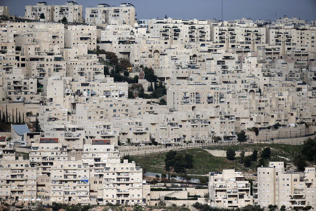 A partial view taken on Dec. 18, 2014, shows the east Jerusalem Israeli settlement of Har Homa from the West Bank city of Bethlehem, which was originally built in the 1990s, in the annexed Arab east Jerusalem area of Jabal Abu Ghneim. (Thomas Coex/AFP/Getty Images)