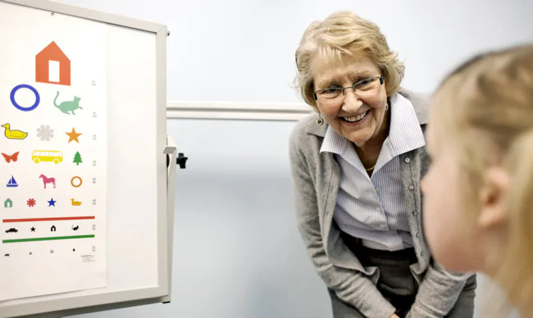 Judith Miles and a patient. (Rebecca F. Miller/U. Missouri)