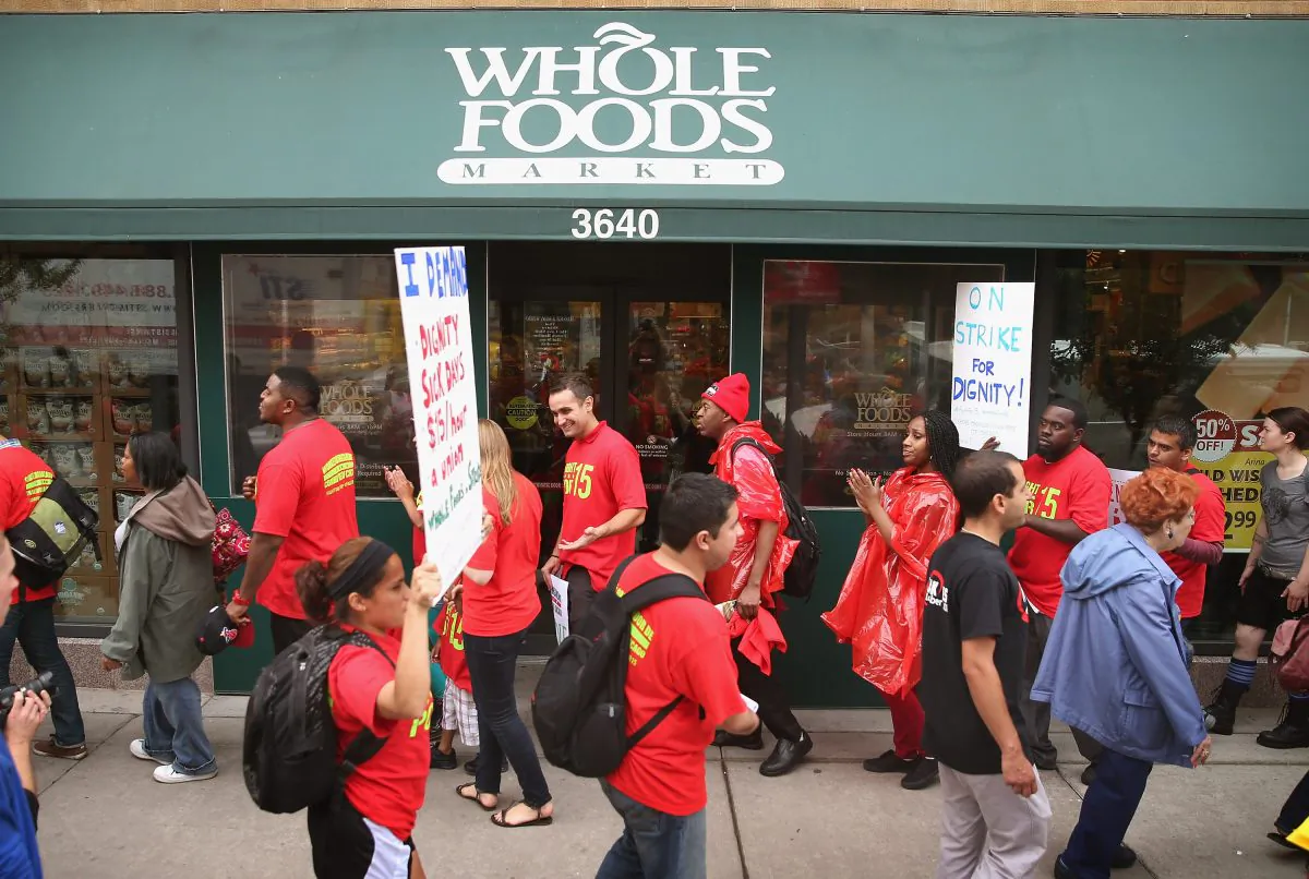 In 2013 Whole Foods Market employees and union activists went on strike    calling for workers to be paid at least $15-per-hour and have the right to form unions without retaliation. (Scott Olson/Getty Images)