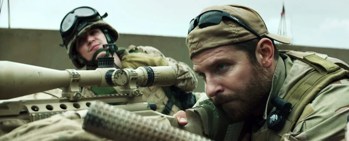 In this image released by Warner Bros. Pictures, Kyle Gallner, left, and Bradley Cooper appear in a scene from "American Sniper." The film is based on the autobiography by Chris Kyle. (AP Photo/Warner Bros. Pictures)