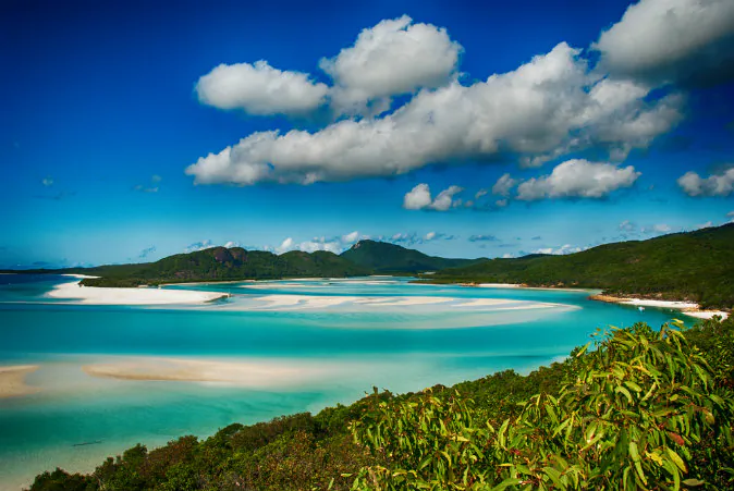 Whitehaven beach lagoon at queensland National Park via Shutterstock*