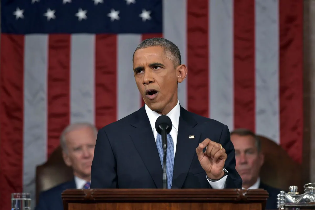 President Barack Obama delivers his State of the Union address to a joint session of Congress on Capitol Hill on Tuesday, Jan. 20, 2015, in Washington. Vice President Joe Biden and House Speaker John Boehner of Ohio, listen in the background. (Mandel Ngan, Pool/AP)