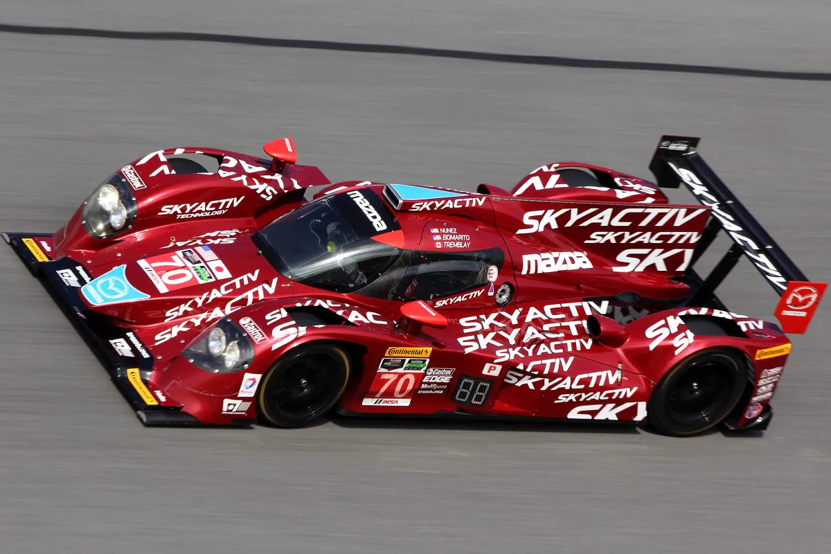 The #70 Mazda diesel prototype streaks along the Daytona International Speedway banking during the Roar Before the 24, Jan 10, 2015. (Chris Jasurek/Epoch Times)