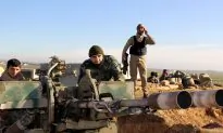 Iraq Premier Says Ground Troops Need More Aid