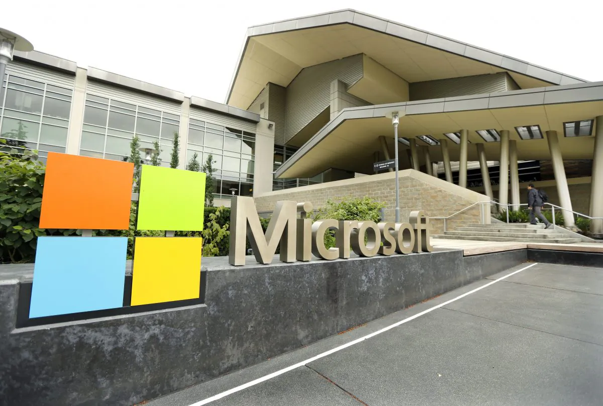Microsoft Corp. signage outside the Microsoft Visitor Center on July 3, 2014. Microsoft is exiting the online ad business and offloading its work to AOL and AppNexus. (Ted S. Warren/AP Photo)