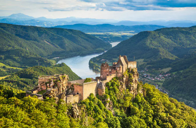 Beautiful landscape with Aggstein castle ruin and Danube River at sunset in Wachau, Austria via Shutterstock*