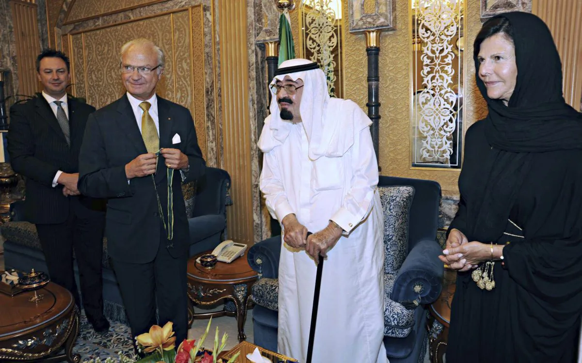 In this Friday, Sept. 30, 2011, file photo released by Saudi Press Agency, King Abdullah of Saudi Arabia, center, poses for a picture with King Carl Gustaf XVI of Sweden, center left, and Queen Silvia, right, before King Abdullah received the Wolf Bronze medal from the Swedish King in Riyadh, Saudi Arabia. On early Friday, Jan. 23, 2015, Saudi state TV reported King Abdullah died at the age of 90. (AP Photo/SPA, File) EDITORIAL USE ONLY, NO SALES