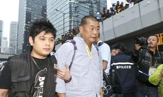 Violence Against Media in Hong Kong Is Seen as Tied to China