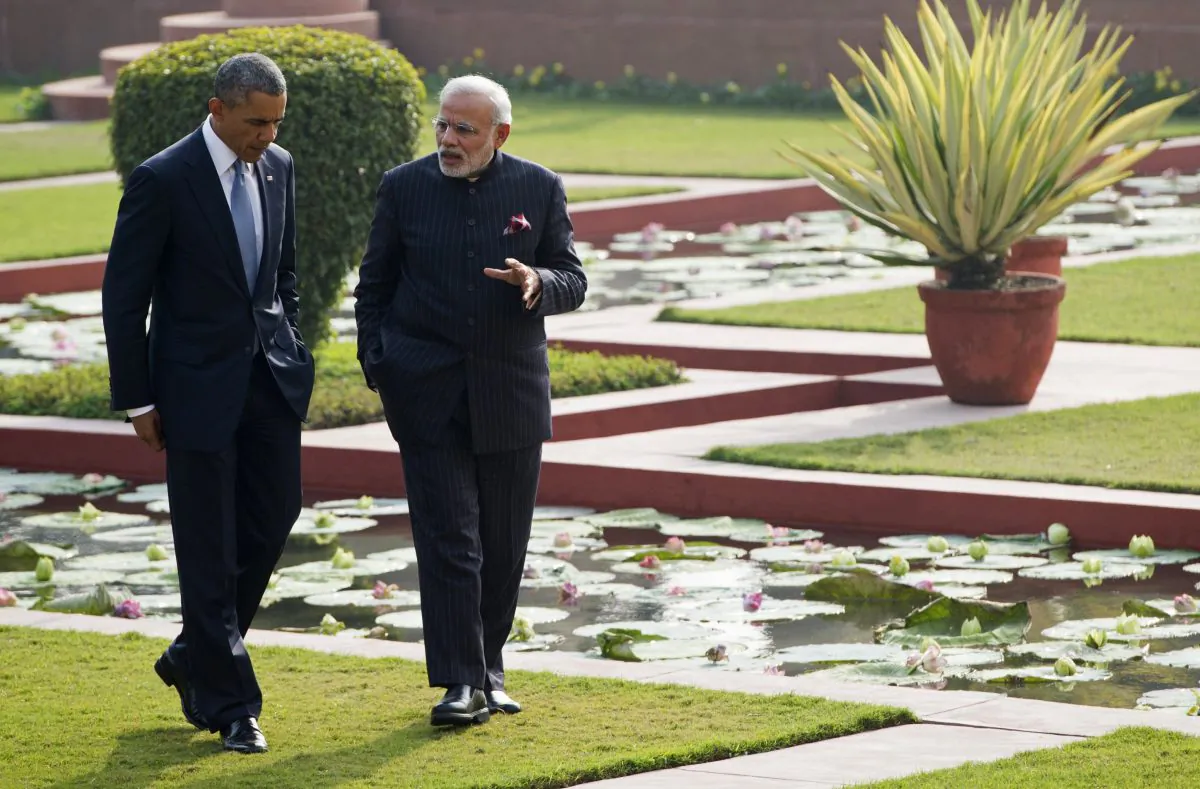 Indian Prime Minister Narendra Modi and U.S. President Barack Obama walk through the gardens between official meetings at Hyderabad House in New Delhi on Jan. 25, 2015. (Saul Loeb/AFP/Getty Images)