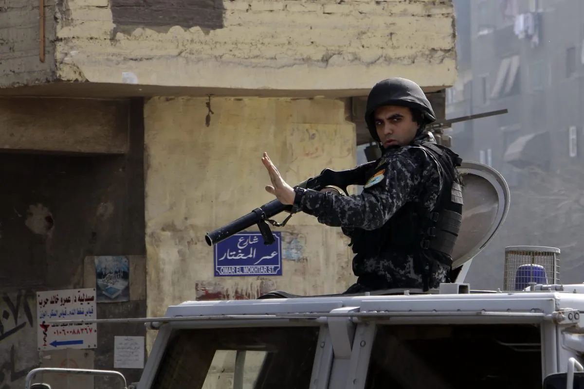 Egyptian security forces deploy in the Cairo suburb of Matariyah, Egypt, Sunday, Jan. 25, 2015. (AP Photo/Ahmed Abdel Fattah) 