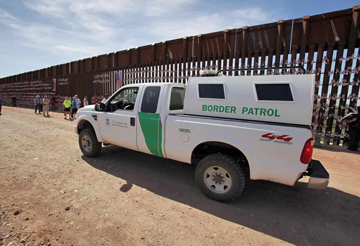 A U.S. Customs and Border Patrol agent patrols along the Arizona-Mexico border wall on Aug. 15, 2010 in Hereford, Ariz. (AP Photo/Matt York)