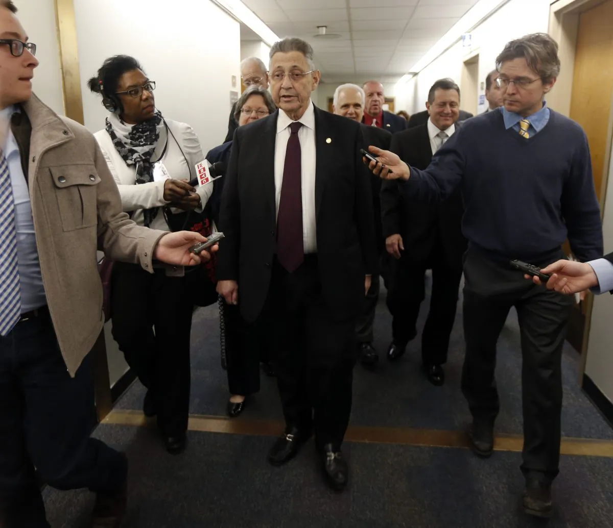 New York State Assembly Speaker Sheldon Silver, D-Manhattan, talks to the media after leaving his legislative office on Monday, Jan. 26, 2015, in Albany, N.Y. (AP Photo/Mike Groll)