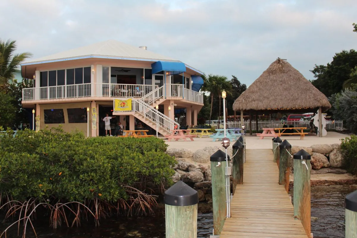 Bayside Grille owner Robert DiGiorgio (black shirt) with General Manager John Brehm serving from the open kitchen in the upstairs restaurant. (Myriam Moran copyright 2015)