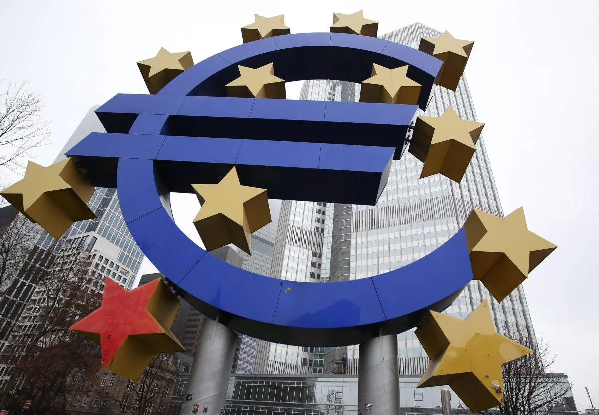 The euro sign sculpture in front of the building that used to host the headquarters of the European Central Bank in Frankfurt, Germany, on Jan. 26, 2015. (Daniel Roland/AFP/Getty Images)