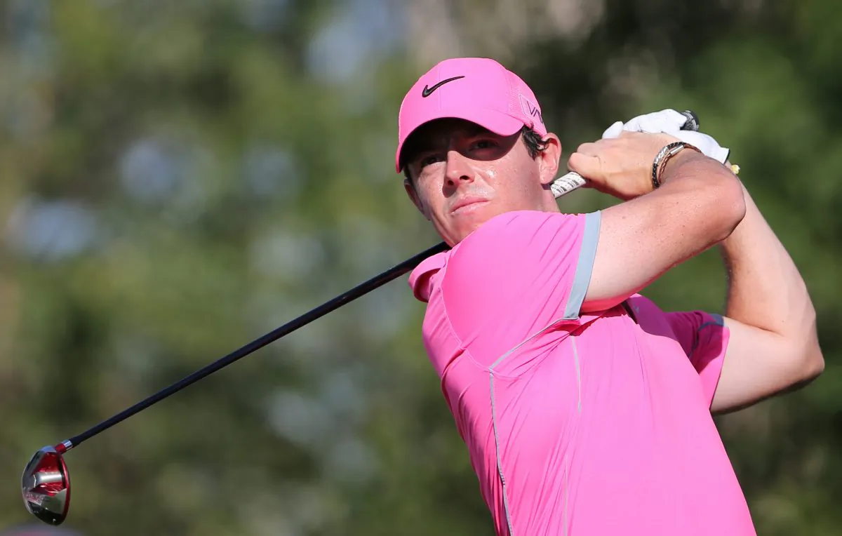 Rory McIlroy of Northern Ireland tees off on the14th hole during the round two of the Dubai Desert Classic golf tournament in Dubai, United Arab Emirates, Friday, Jan. 30, 2015. (AP Photo/Kamran Jebreili)