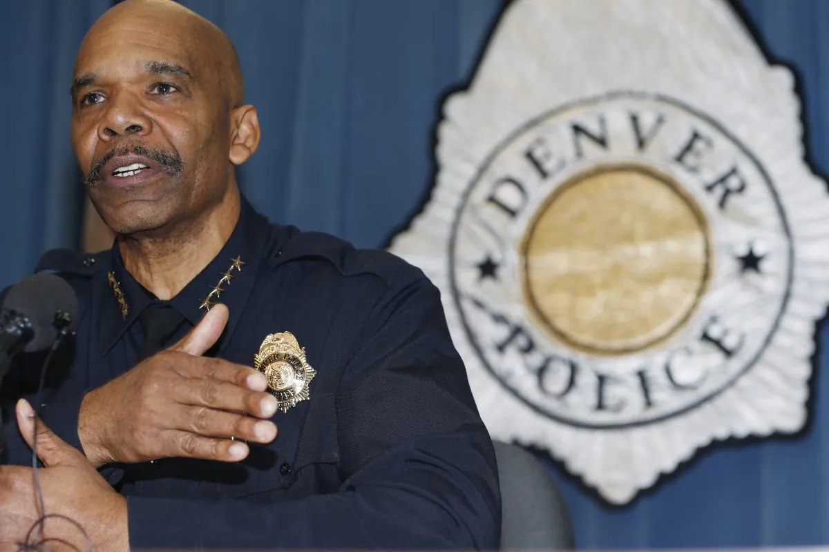 Denver Police Department Chief Robert White responds to questions during a news conference in Denver,  Jan. 29, 2015. He has faced calls for his resignation after vandals defaced a police memorial on Saturday.  (AP Photo/David Zalubowski)