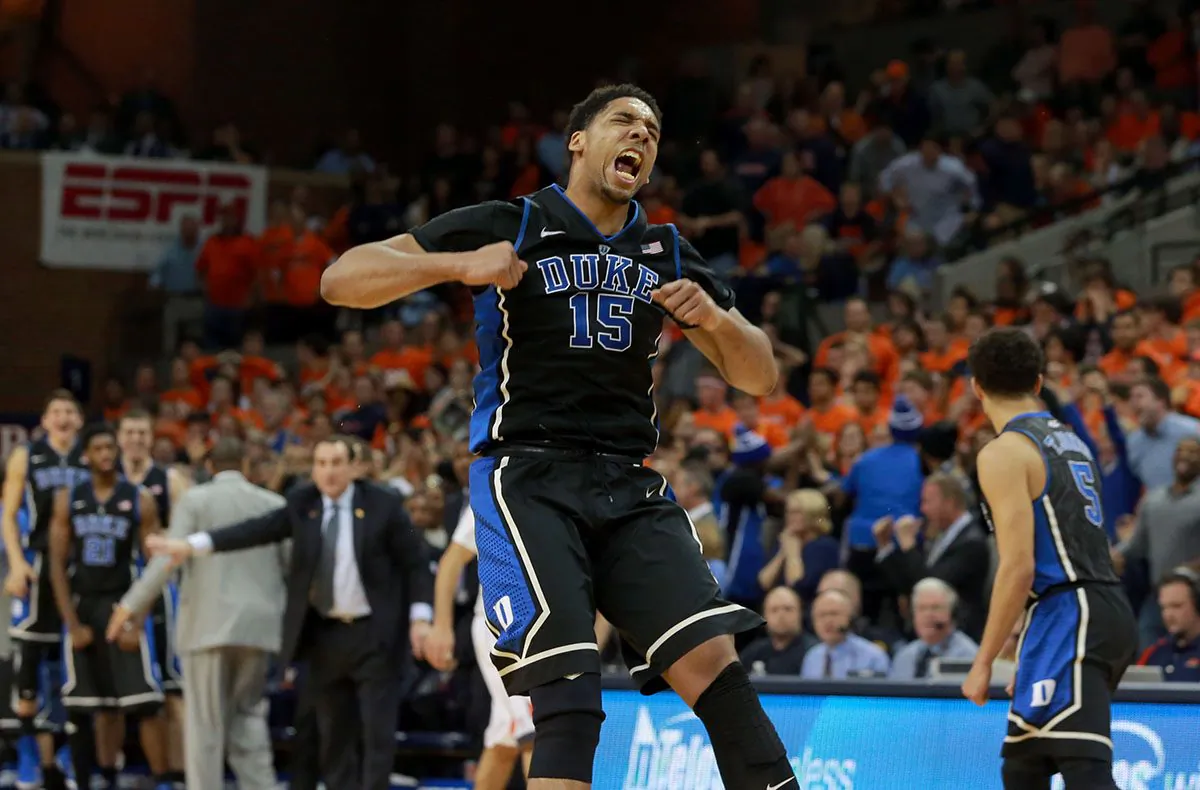 Duke's Jahlil Okafor (15) celebrates as the team leads Virginia late in the second half of an NCAA college basketball game in Charlottesville, Va., on Saturday, Jan. 31, 2015. Duke won 69-63. (AP Photo/Richmond Tiimes-Dispatch, Daniel Sangjib Min)