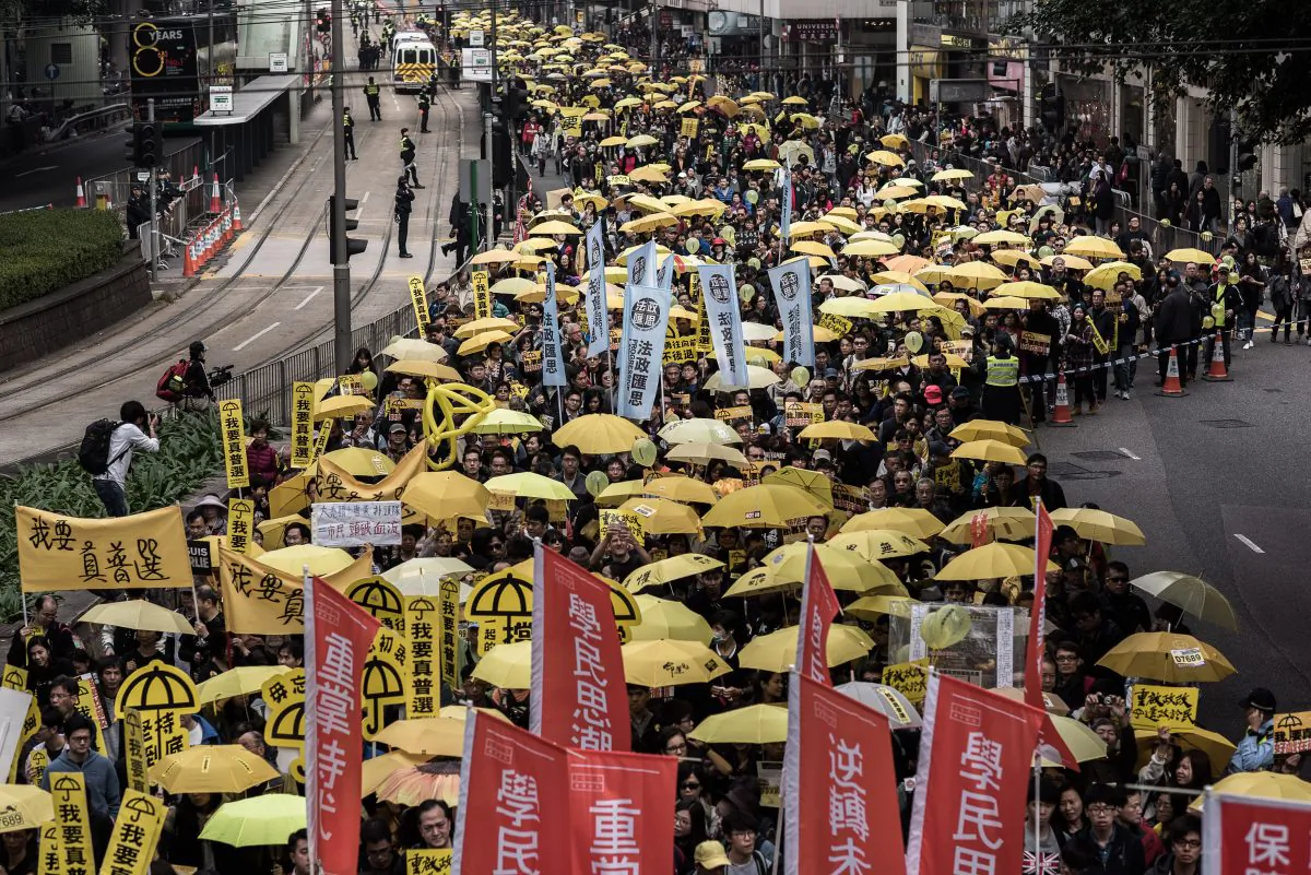 Demonstrators march for democracy in Hong Kong on Feb. 1, 2015. (Philippe Lopez/AFP/Getty Images)