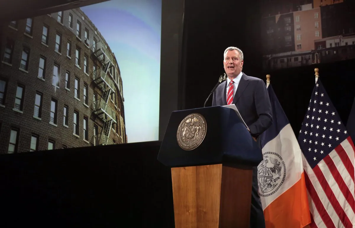 New York Mayor Bill de Blasio delivers his State of the City address at Baruch College, in New York, Tuesday, Feb. 3, 2015. He detailed his ambitious plans to build and preserve affordable housing throughout New York City. (AP Photo/Richard Drew)