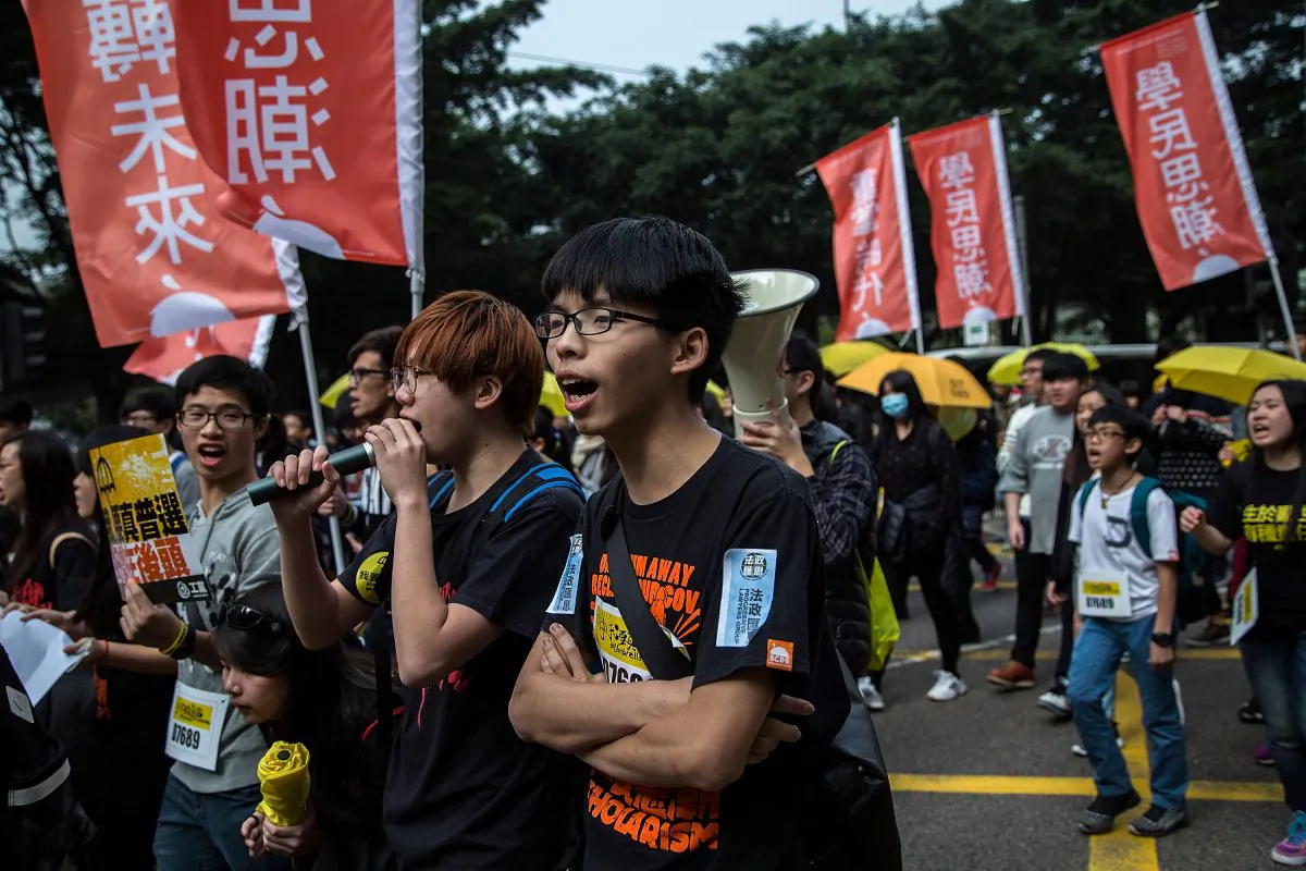 Joshua Wong, student leader, shouts during tens of thousands of protesters march for the real universal suffrage on Feb. 1, 2015 in Hong Kong. (Lam Yik Fei/Getty Images)