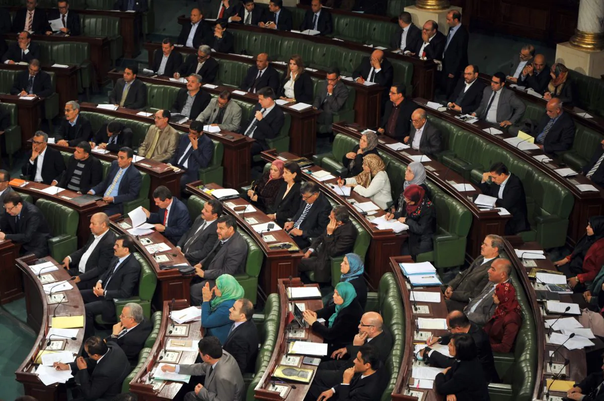 Tunisian Ennahda Islamist party deputies attend a parliamentary session to present the new government in Tunis on Feb. 4, 2015. (Fethi Belaid/AFP/Getty Images)