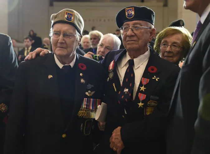 Canadian veteran Charles Mann (L) and U.S. veteran Eugene Gutierrez stand following the presentation of the Congressional Gold Medal during a ceremony on Capitol Hill in Washington on Feb. 3, 2015. The award was given to the surviving members of the First Special Service Force, aka the Devil’s Brigade, whose fearlessness and bravery contributed to the liberation of Europe and the end of World War II. (AP Photo/Susan Walsh)