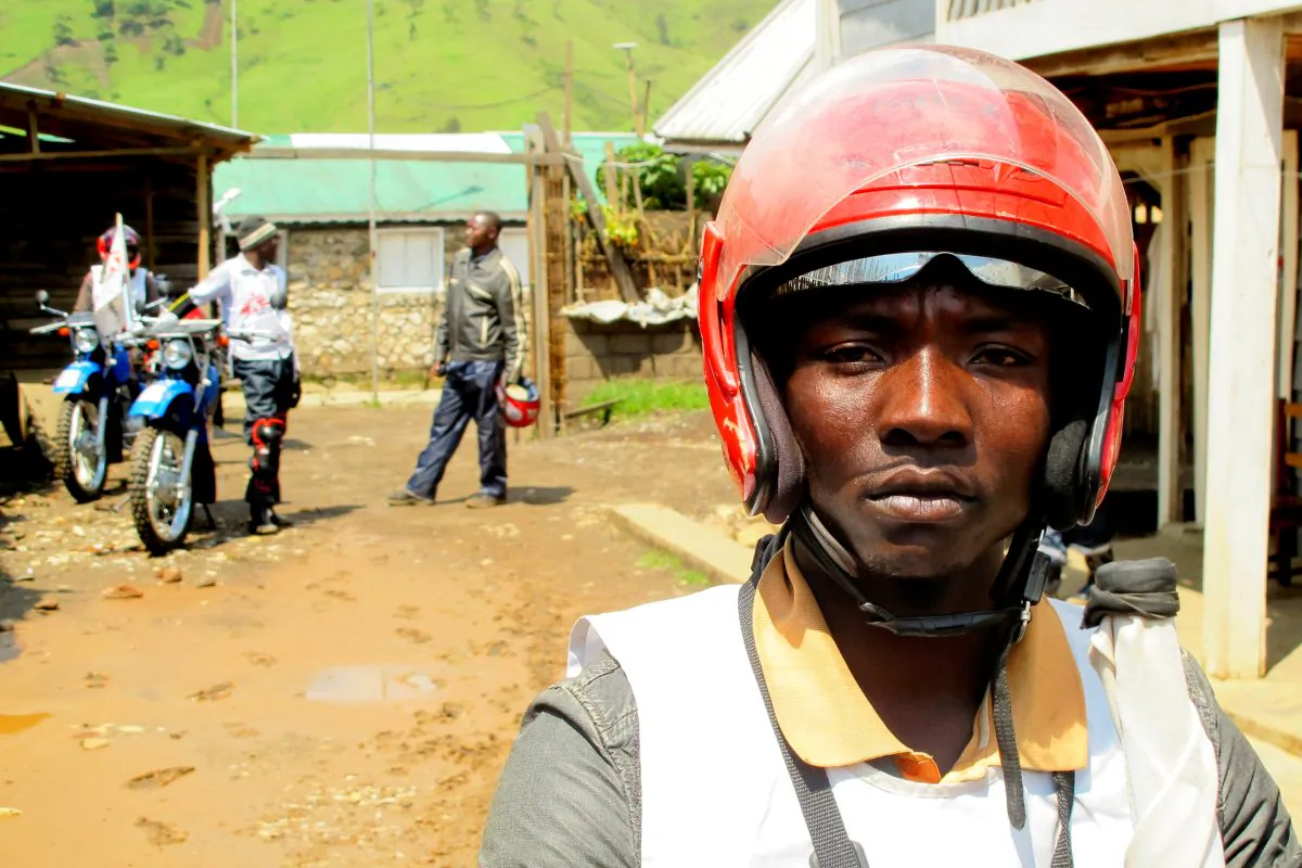 Medcins sans Frontieres motorcyclist Akonkwa Kacihambra takes the sick to the hospital no matter how challenging the situation in the Democratic Republic of the Congo. [Pau Miranda/MSF]