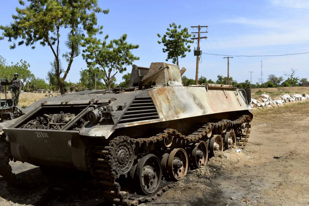 This picture taken on November 12, 2014 in front of the military base of Amchide, northern Cameroon, 1 km from Nigeria, shows a Boko Haram tank destroyed by Cameroonian soldiers during an attack against the military base by the Islamic fighters on October 15, 2014. (Reinnier Kaze/AFP/Getty Images)