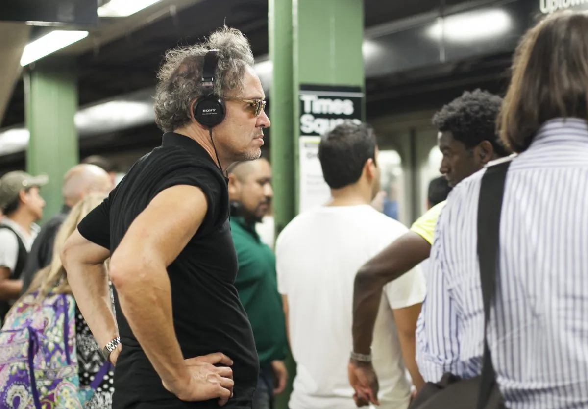 Commuters wait on the platform at the Times Square subway station in Manhattan, New York, August 27, 2014. (Samira Bouaou/Epoch Times)