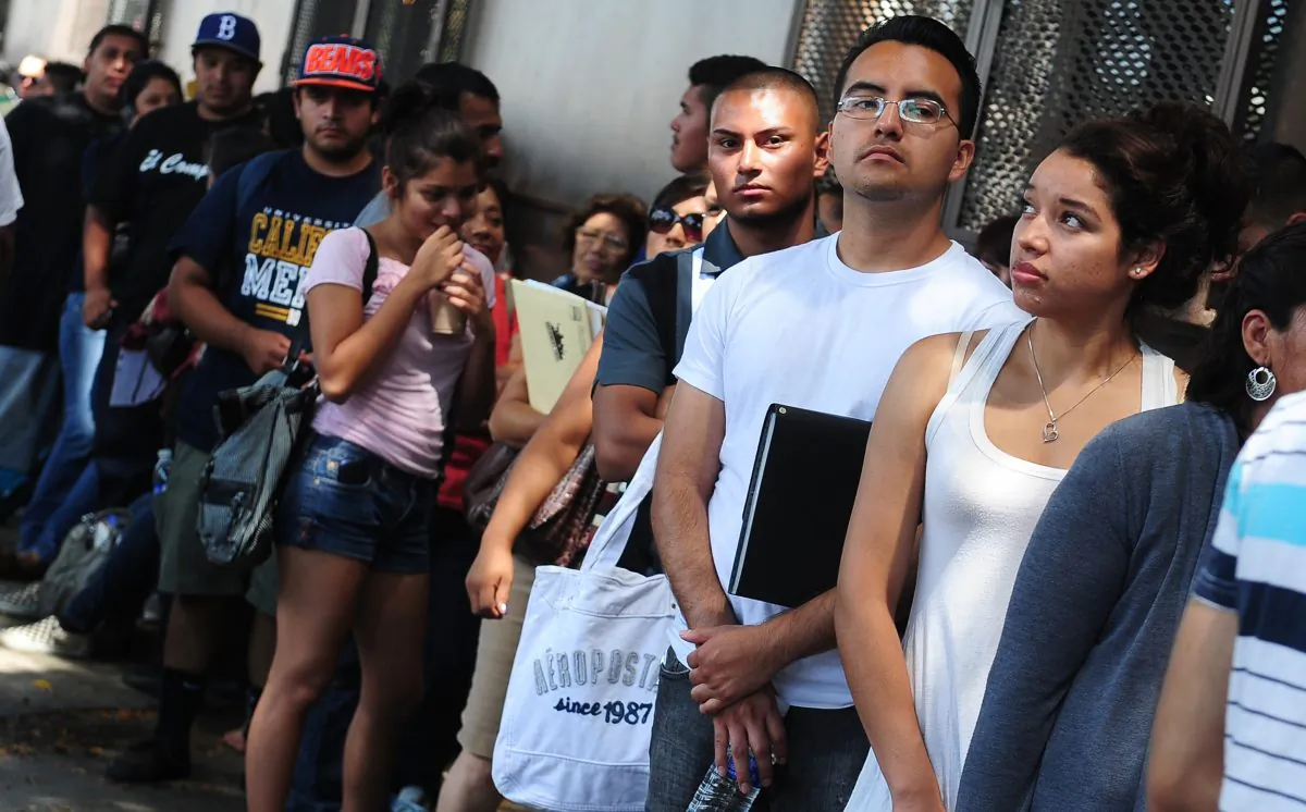 Young people wait in line to enter the office of The Coalition for Humane Immigrant Rights in Los Angeles on Aug. 15, 2012. (Frederic J. Brown/AFP/GettyImages)