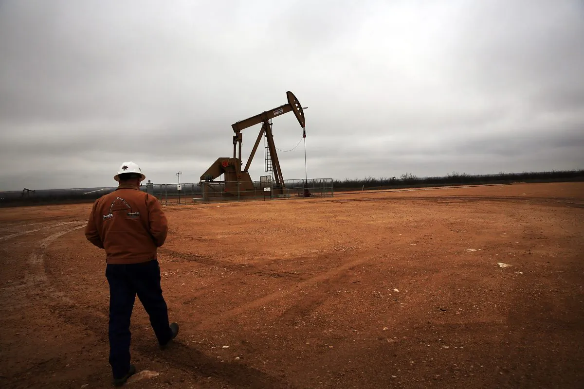 An oil well owned an operated by Apache Corporation in the Permian Basin in Garden City, Texas, on Feb. 5, 2015. (Spencer Platt/Getty Images)