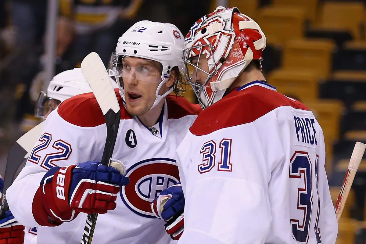Montreal’s Dale Weise congratulates Carey Price after the game against the Boston Bruins at TD Garden on Feb. 8, 2015 in Boston. (Maddie Meyer/Getty Images)