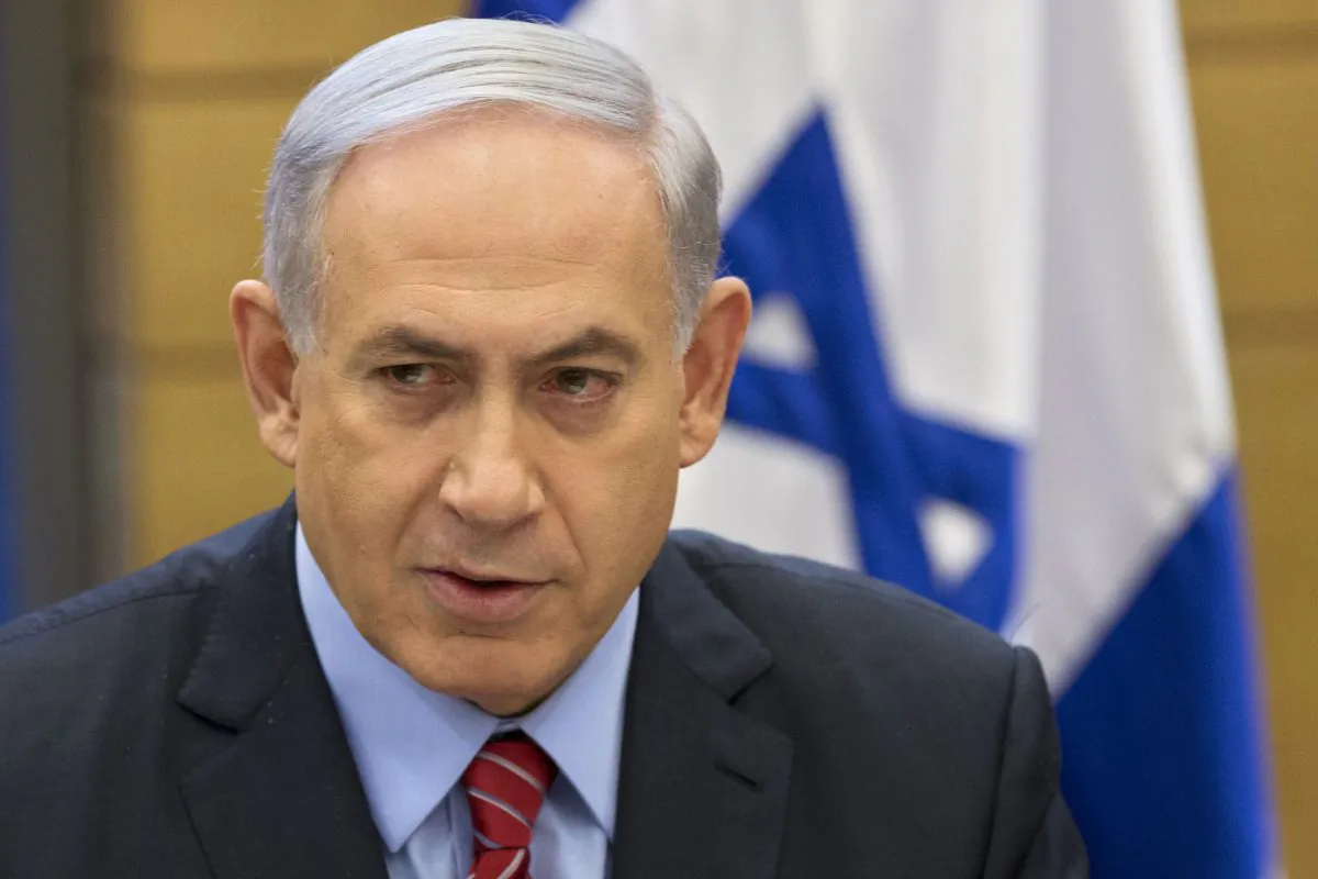 Israeli Prime Minister Benjamin Netanyahu speaks during a faction meeting at the Knesset, Israel's parliament in Jerusalem on Dec. 3, 2014. (AP Photo/Sebastian Scheiner)