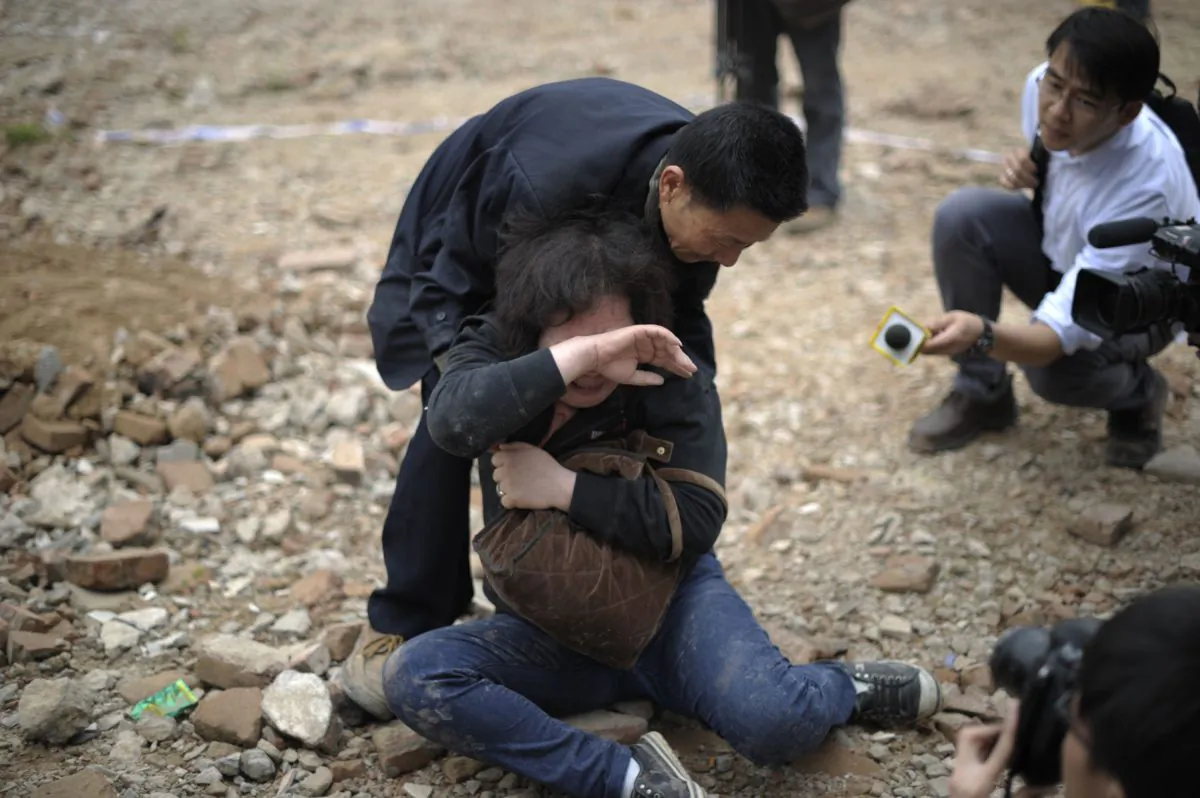 A homeowner who failed to protect her home from demolition in Guangzhou, in south China's Guangdong Province on March 21, 2012. Real estate companies work hand-in-glove with corrupt officials in order to get land cleared for development. (STR/AFP/Getty Images)