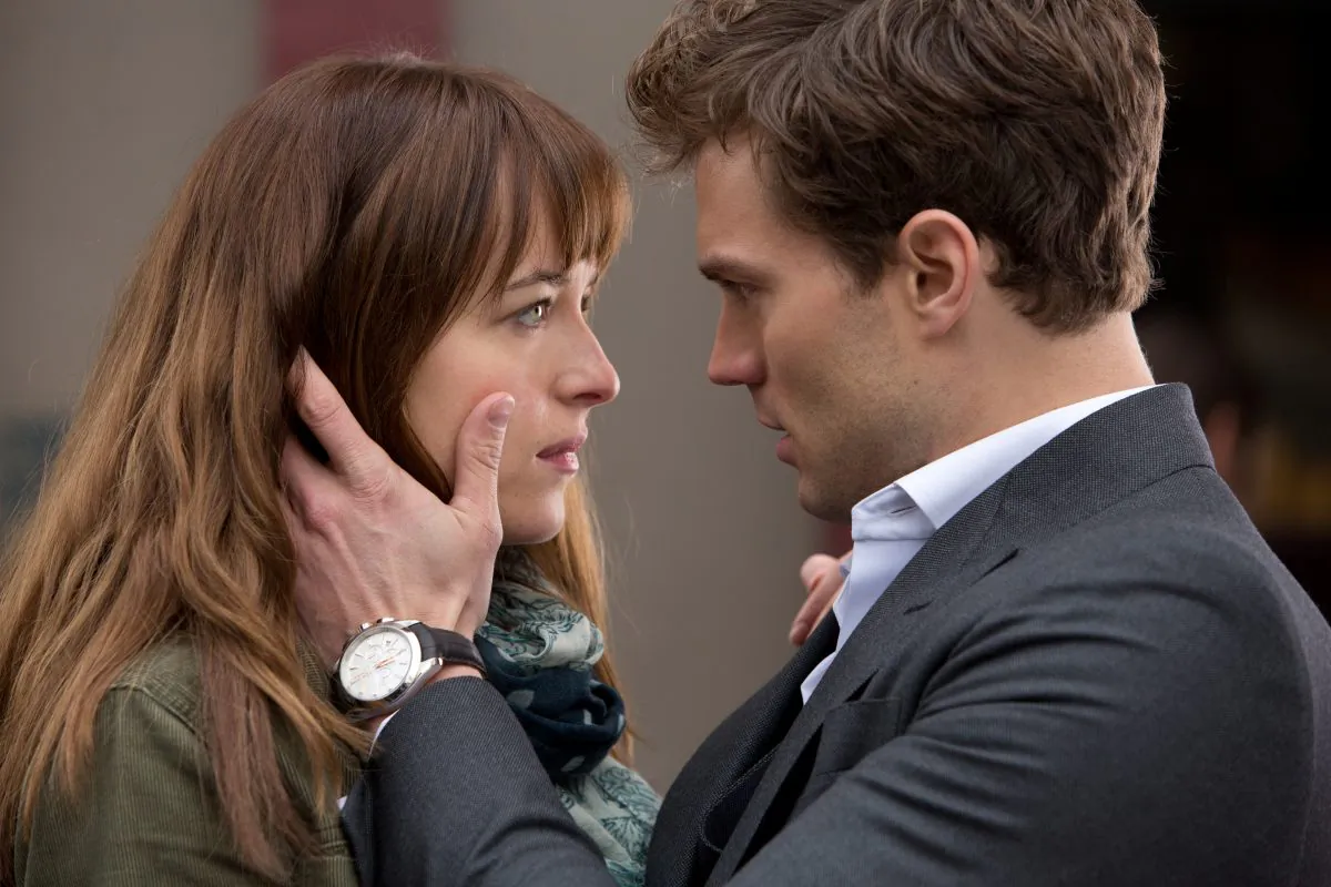 Billionaire entrepreneur Christian Grey (Jamie Dornan) and curious college student Anastasia Steele (Dakota Johnson) in "Fifty Shades of Grey." ( Chuck Zlotnick/Universal Studios/Focus Features)