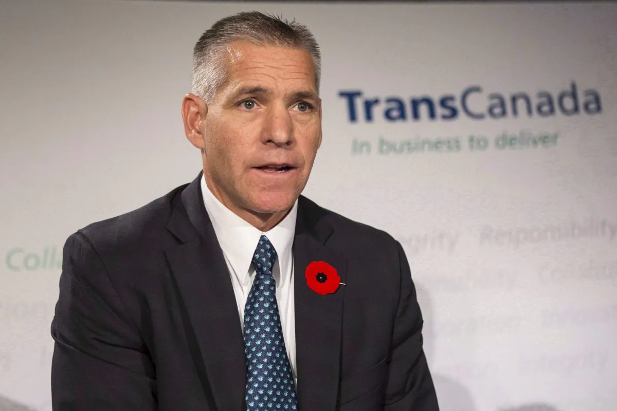 TransCanada CEO Russ Girling speaks at a news conference in Toronto on Oct. 30, 2014.
Girling says he deosn’t agree with the U.S. Environmental Protection Agency’s view that the Keystone XL pipeline's role in climate change must be reconsidered in light of the steep drop in crude prices. (The Canadian Press/Chris Young)