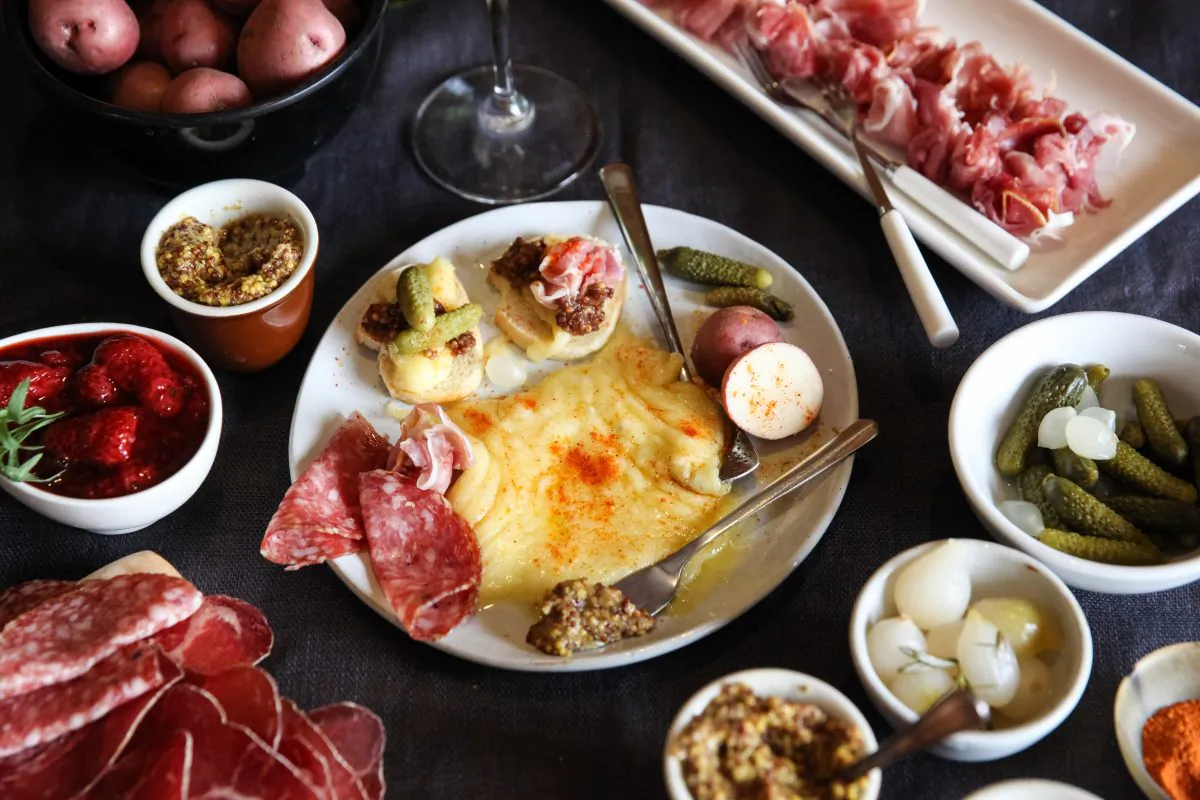 A plate of swiss raclette cheese surrounded by various cured meats, spreads, and breads. Had this course not been so good, perhaps I wouldn’t have descended into food coma. (Deer Valley Resort)
