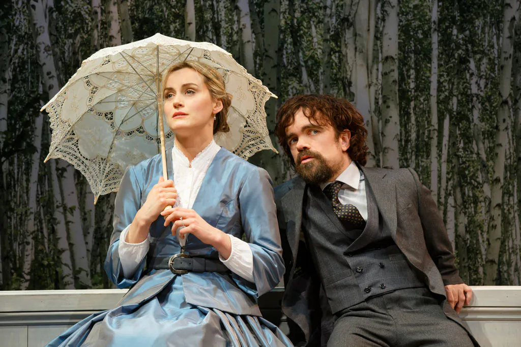 Natalya (Taylor Schilling) is bored with her life on the estate, but her many love interests, including Mikhail Rakitin (Peter Dinklage), keep her entertained in Ivan Turgenev’s classic “A Month in the Country.” (Joan Marcus)