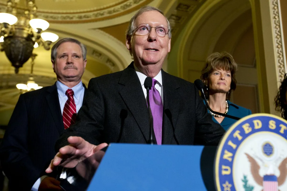 Senate GOP Leader Mitch McConnell of Ky., (C) speaks about Keystone XL with Sen. John Hoeven, R-N.D., (L) sponsor of the Keystone XL pipeline bill, and Sen. Lisa Murkowski, R-Alaska, in Washington, D.C., on Jan. 29, 2015.   (AP Photo/Jacquelyn Martin)