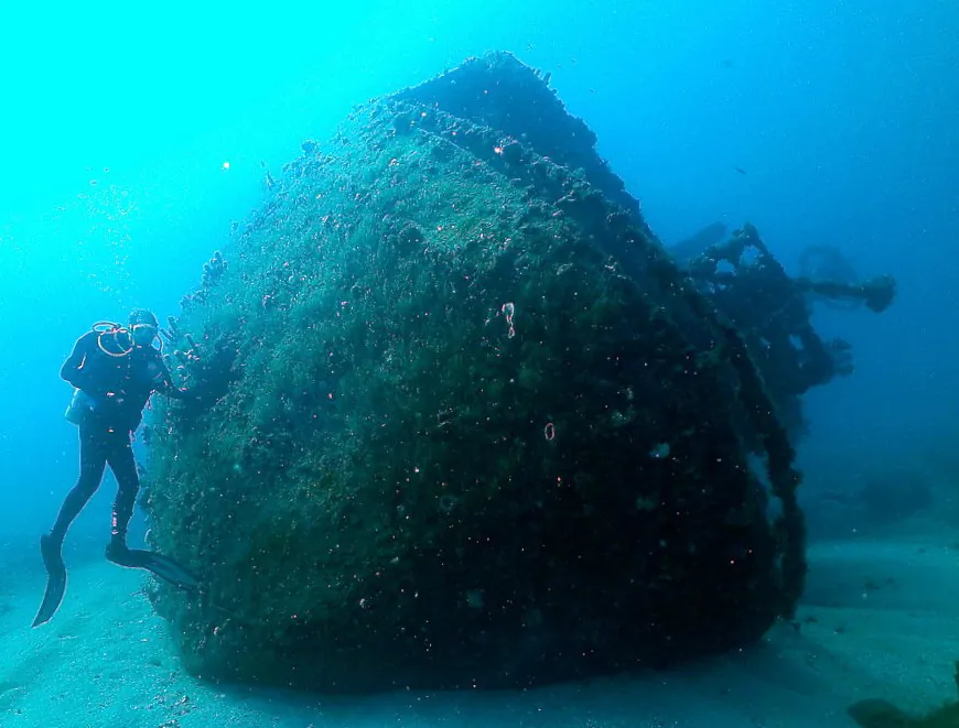 Shipwrecks offer divers fascination and discovery. Palm Beach County has sunk many derelict vessels as artificial reefs. Attaching organisms and goliath groupers abound and offer fun and discovery. Attention and diver vigilance is necessary so as never to exceed limitations. Environmental awareness is also imperative if there is limited visibility, current, obstructions, fishing gear and lines, fire coral and sharp edges. (John Christopher Fine copyright 2014)
