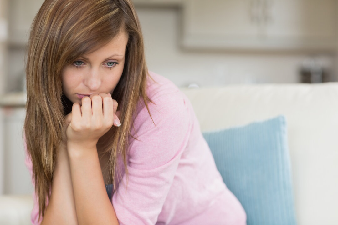Everyone moves through the grieving process at his or her own pace, so don't feel you need to be done if you don't feel ready. (Digital Vision./Photodisc/Thinkstock)