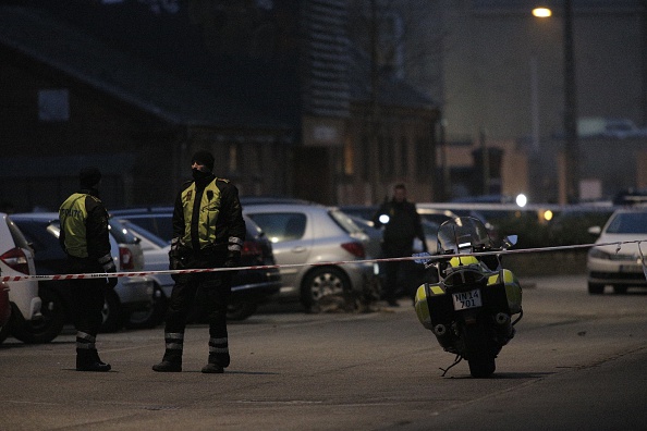 Policemen secure the area around a building in Copenhagen, Denmark, where shots were fired on February 14, 2015 outside the venue of a debate held on Islam and free speech. According to Danish media, the French ambassador to Denmark attended the discussion. Unidentified assailants fired on a building where the debate was being held, the French ambassdor to Denmark told AFP from inside the venue. Reports said that Swedish artist Lars Vilks, the author of controversial Prophet Mohammed cartoons published in 2007 that sparked worldwide protests, was also at the debate.           AFP PHOTO / MARTIN SYLVEST / SCANPIX DENMARK   +++   DENMARK OUT        (Photo credit should read MARTIN SYLVEST/AFP/Getty Images)
