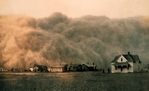 Dust storm in Texas during the Dust Bowl of the 1930s. New research finds that the American West is set to face a megadrought, worst than the Dust Bowl, in the next century due to climate change. Photo by: Public Domain. 
