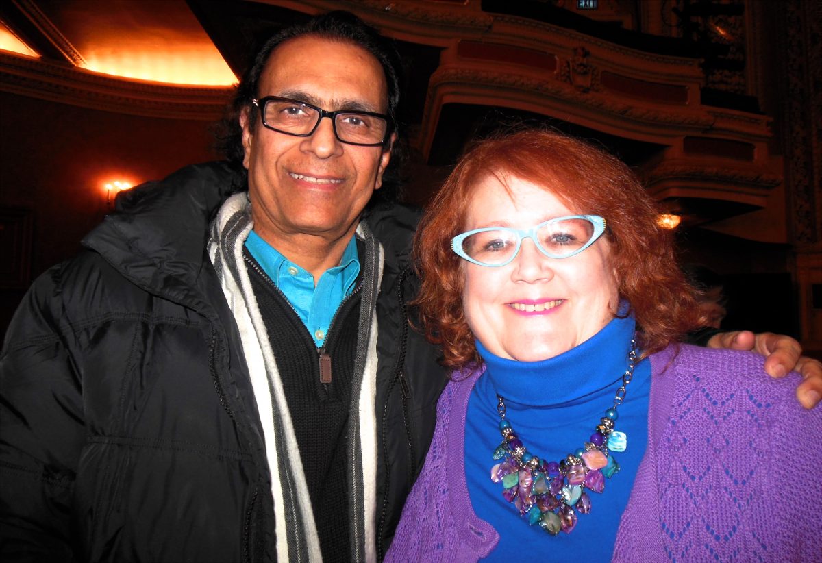 Dr. Leo Parvis and his companion enjoy Shen Yun Performing Arts at the Orpheum Theatre on Feb.14. (Epoch Times)