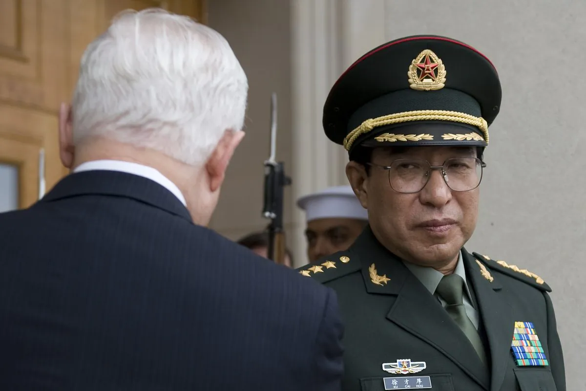 US Secretary of Defense Robert Gates (L) greets the People's Republic of China Central Military Commission Vice Chairman General Xu Caihou (R) at the Pentagon in Washington, DC, October 27, 2009. Xu, tried to move over 10 billion yuan in assets to Hong Kong, according to the Hong Kong newspaper Oriental Daily. (Jim Watson/AFP/Getty Images)